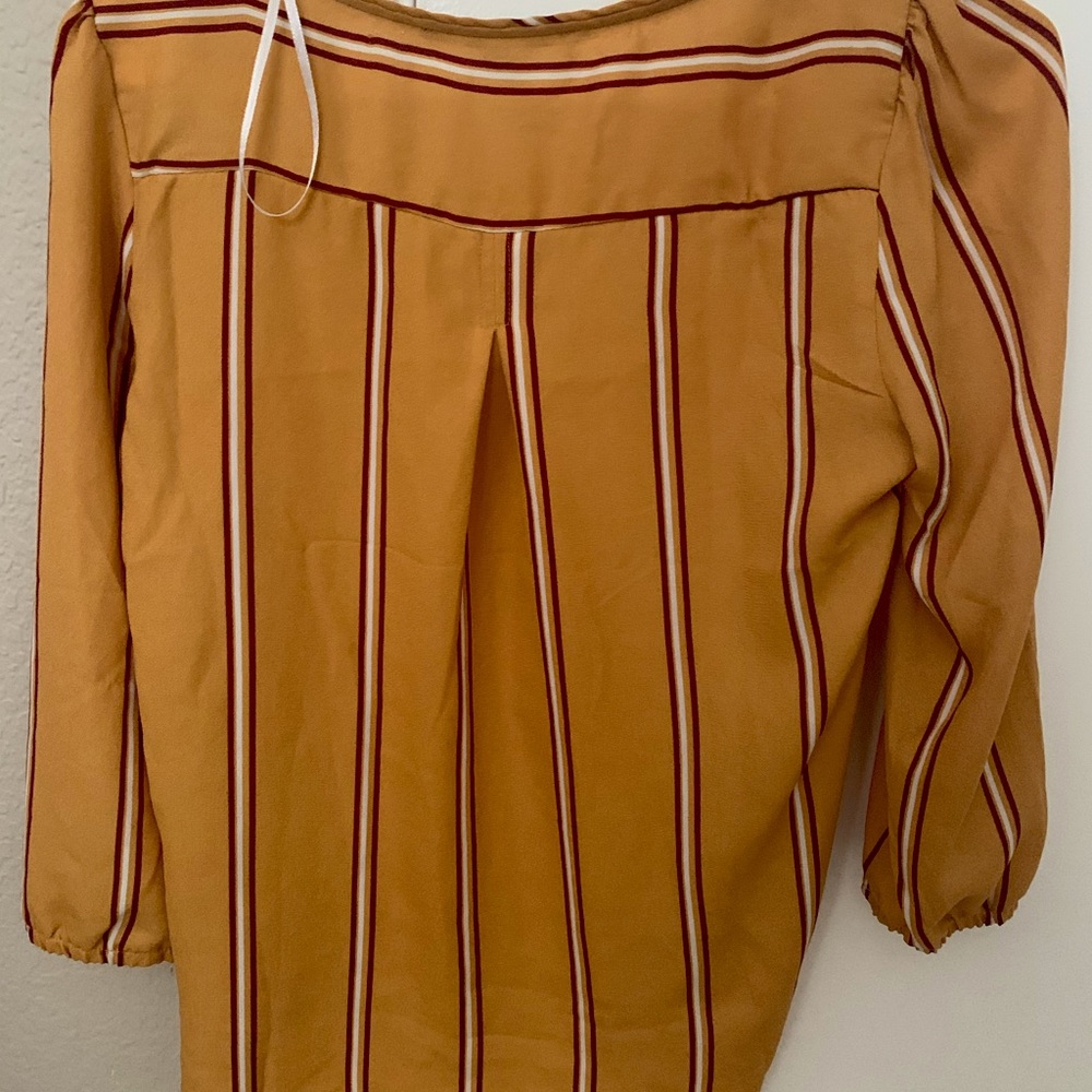 yellow stripped shirt